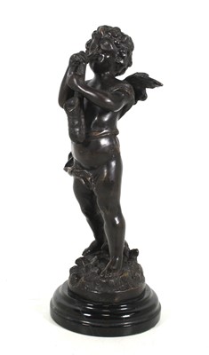 Lot 15 - A reproduction bronze figure of a putti,...