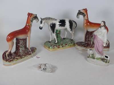 Lot 108 - A collection of four Staffordshire pottery...