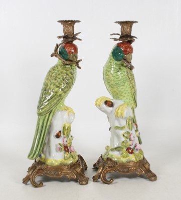 Lot 22 - A pair of reproduction gilt metal mounted...