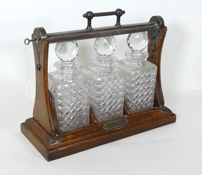 Lot 32 - A Victorian Grinsell's patent tantalus, having...