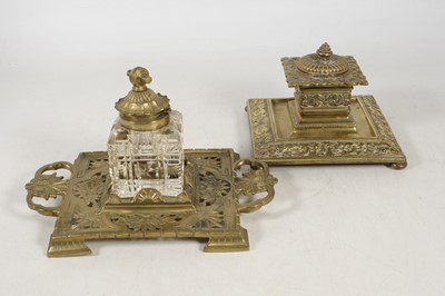 Lot 30 - An early 20th century cast brass inkwell, the...