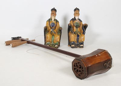 Lot 44 - A pair of Chinese terracotta figures of...