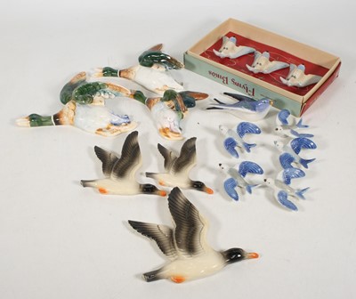 Lot 46 - A collection of pottery wall plaques, to...