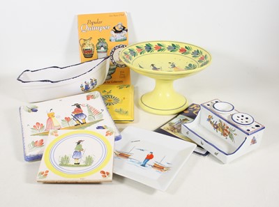 Lot 54 - A collection of Quimper polychrome glazed...