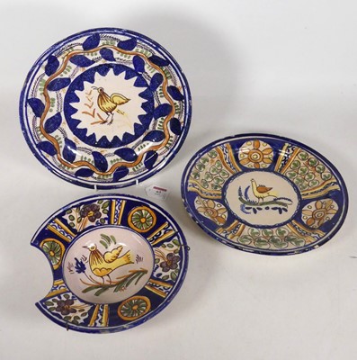 Lot 63 - A polychrome tin-glazed earthenware shaving...