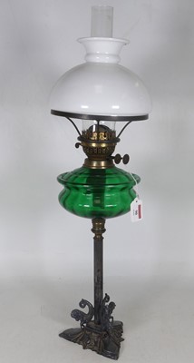 Lot 90 - An early 20th century oil lamp, having a domed...