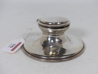 Lot 196 - A George V silver capstan inkwell of typical...