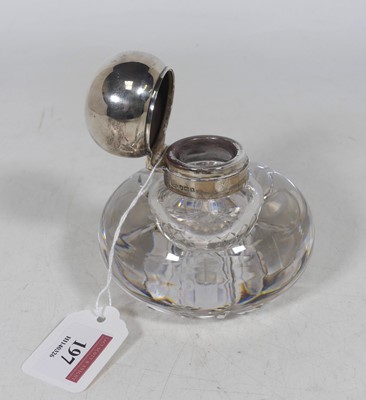 Lot 197 - An Edwardian silver inkwell, the squat...