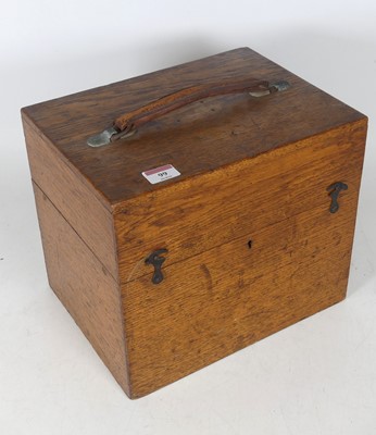 Lot 99 - An early 20th century oak instrument case,...