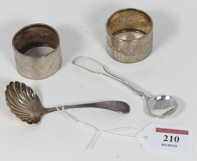 Lot 210 - A silver sifting spoon having a shell shaped...