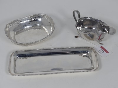 Lot 227 - A modern silver pin or pen tray of rounded...