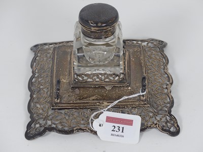 Lot 231 - A Victorian silver desk stand of shaped square...
