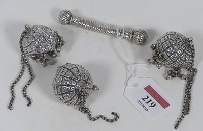 Lot 219 - Three Tibetan? white metal spheres, each...
