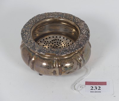 Lot 232 - A George III silver lemon strainer in two...