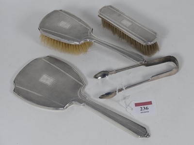 Lot 236 - A pair of Victorian silver sugar tongs,...