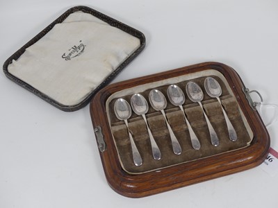 Lot 246 - A set of six George V silver coffee spoons in...