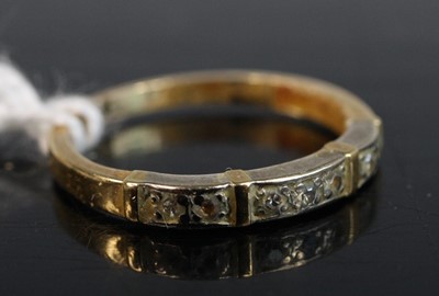 Lot 249 - An 18ct gold diamond point set half eternity...