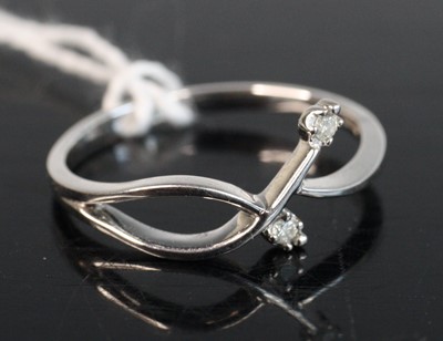 Lot 257 - A modern 9ct white gold and diamond set dress...