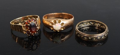 Lot 266 - An early 20th century yellow metal opal...