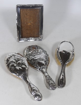Lot 162 - An Edwardian silver-clad dressing table hand...