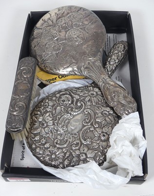 Lot 323 - An Edwardian silver backed hand mirror...