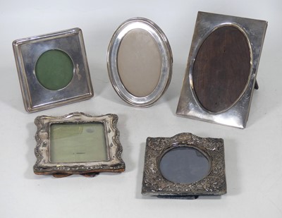 Lot 171 - A silver-clad easel photograph frame, of...