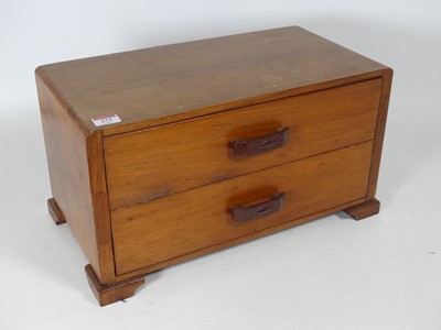 Lot 173 - An Art Deco walnut two-drawer canteen,...