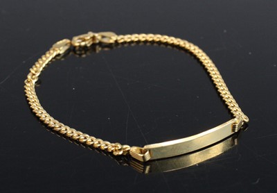 Lot 272 - A child's 18ct gold flat curb link identity...