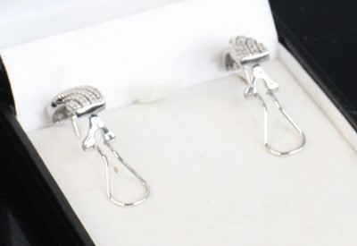 Lot 275 - A pair of modern 9ct white gold and diamond...