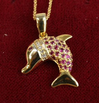 Lot 276 - A modern 14ct gold ruby and diamond set...