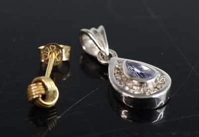Lot 286 - A modern 9ct white gold tanzanite and diamond...