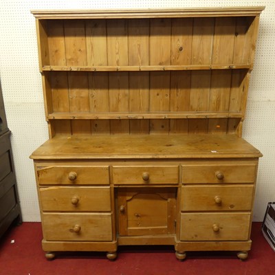Lot 1113 - A Victorian pine kitchen dresser, having a two-...