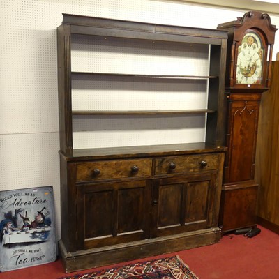 Lot 1117 - An oak compact dresser, having two-tier open...