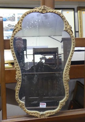 Lot 1071 - A gilt composition framed art wall mirror, h....