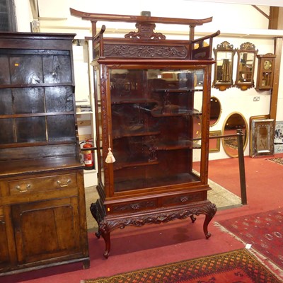 Lot 1133 - A 20th century Chinese carved hardwood...