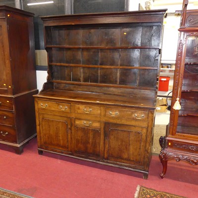 Lot 1134 - An 18th century provincial joined elm and oak...