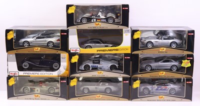 Lot 594 - 10 Maisto 1/18th scale diecast cars, to...