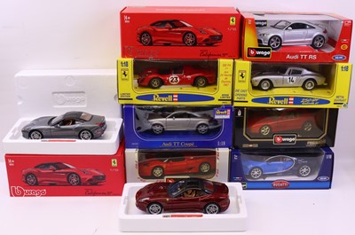 Lot 565 - Nine 1:18 scale Burago and Revell diecast cars,...