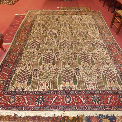 Lot 1152 - A Persian woollen 'Tree of Life' rug, approx...