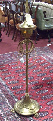 Lot 1169 - An Edwardian gilt brass standard lamp,...