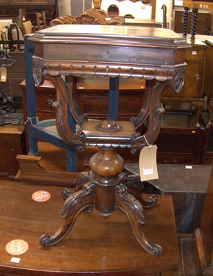 Lot 1179 - A mid-Victorian rosewood hinge top work table,...