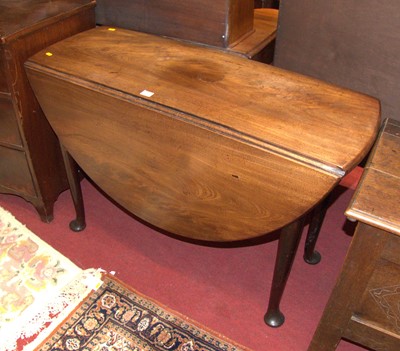 Lot 1186 - An early George III mahogany drop leaf dining...