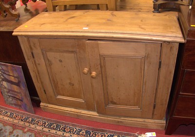 Lot 1201 - A rustic pine double door low side cupboard,...