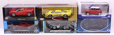 Lot 562 - Six boxed 1:18 scale modern issue diecast cars...