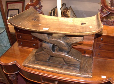 Lot 1210 - A carved and stained tribal Ashanti stool,...
