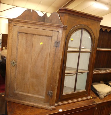 Lot 1226 - A fruitwood single door glazed hanging corner...