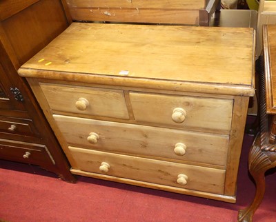 Lot 1232 - A Victorian pine low chest of two short over...