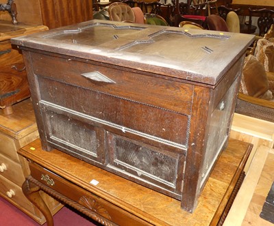 Lot 1234 - A geometric moulded oak hinge top blanket...