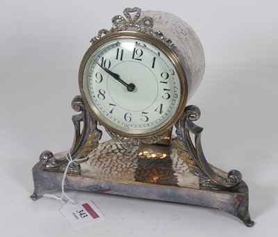 Lot 343 - An Edwardian silver plated mantel clock, of a...