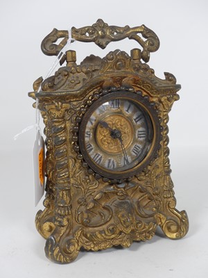 Lot 344 - A Baroque style gilt metal cased mantel clock,...